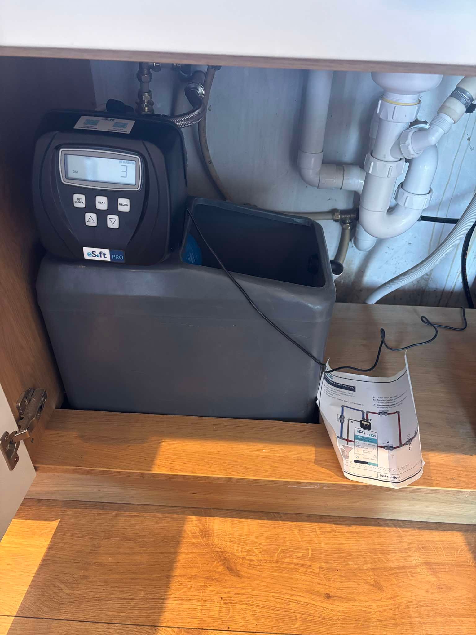eSoft Pro water softener installed under kitchen sink, The Pipe Guy Kildare